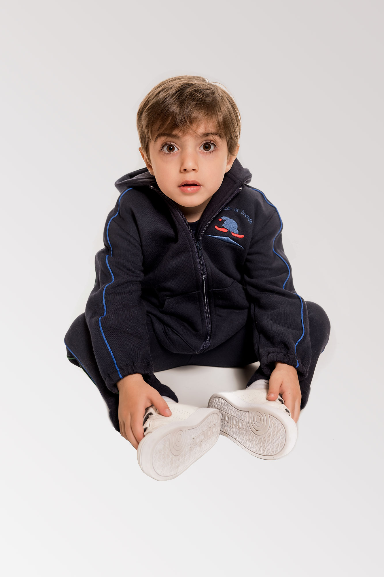 CAMPERA CON CAPUCHA